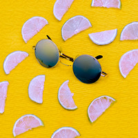 Fashion Mix. Stylish Sunglasses and Lemons. Be in trend